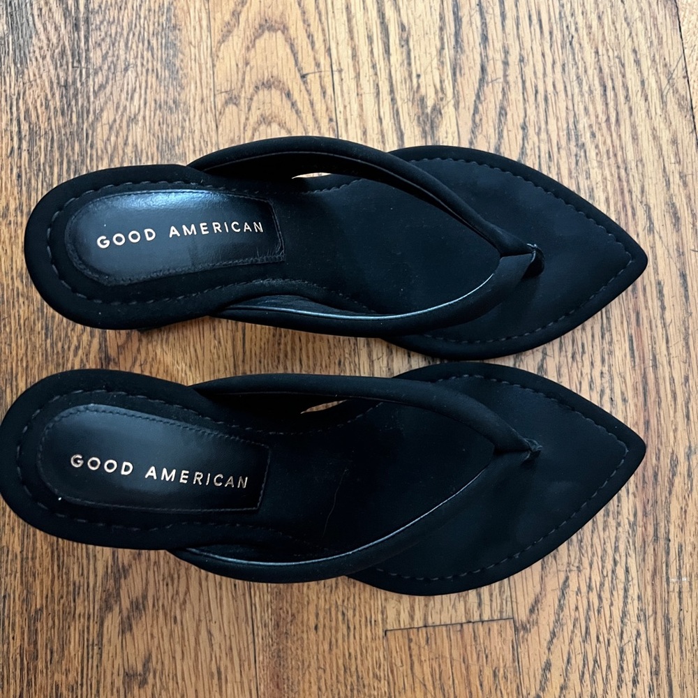 Good American black thong with lucite wedge heels